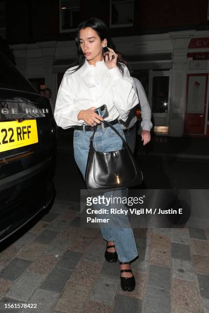 Dua Lipa seen on a night out at Chiltern Firehouse on July 21, 2023 in London, England.