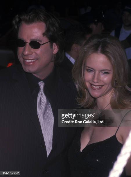 Actor John Travolta and actress Kelly Preston attend the 'Swordfish' New York City Premiere on May 11, 2001 at the Ziegfeld Theater in New York City.
