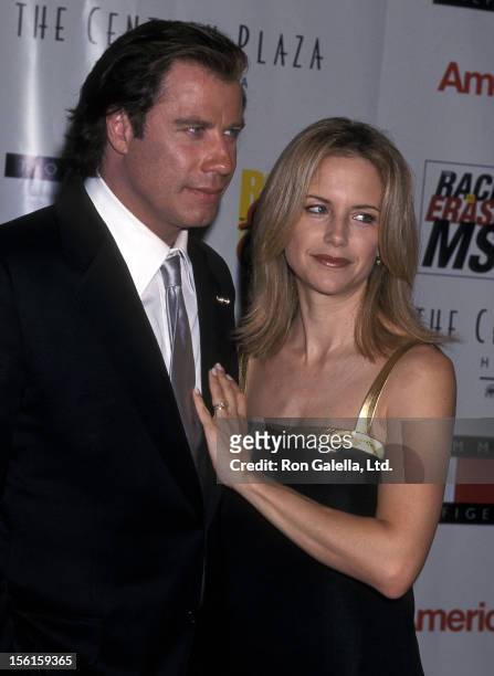 Actor John Travolt and actress Kelly Preston attend the Nancy Davis Foundation's Eighth Annual Race to Erase MS Gala on May 18, 2001 at the Century...