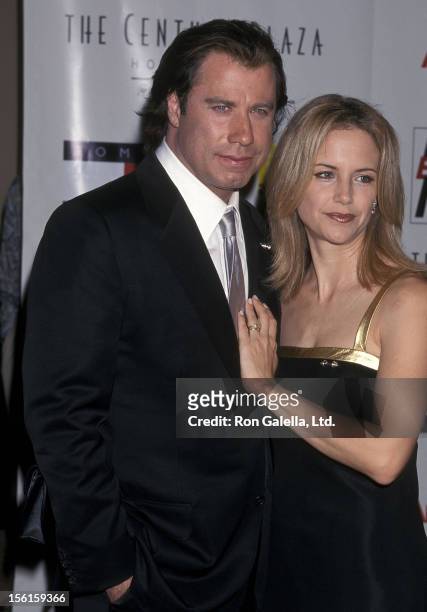 Actor John Travolt and actress Kelly Preston attend the Nancy Davis Foundation's Eighth Annual Race to Erase MS Gala on May 18, 2001 at the Century...