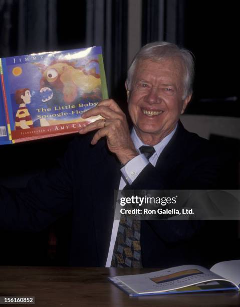 Jimmy Carter attends book party for 'The Little Baby Snoogle Fleejer' on December 13, 1995 at Barnes and Noble in New York City.