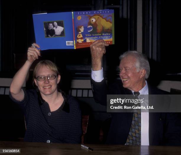 Amy Carter and Jimmy Carter attend book party for 'The Little Baby Snoogle Fleejer' on December 13, 1995 at Barnes and Noble in New York City.