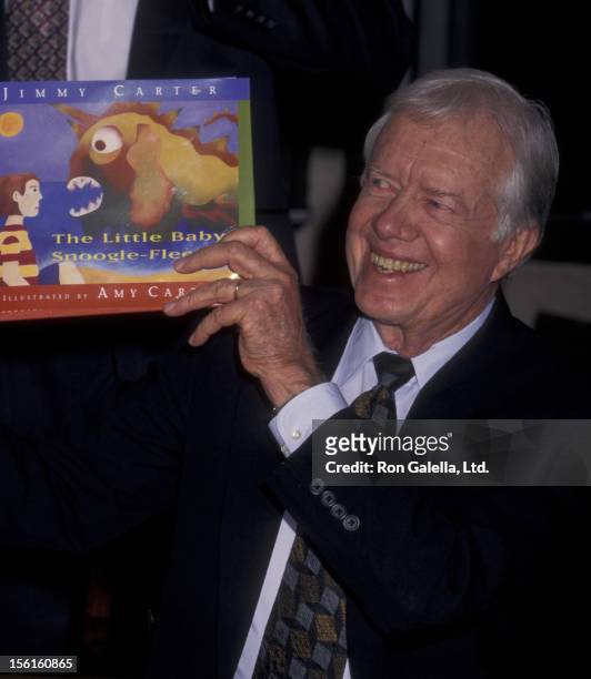 Jimmy Carter attends book party for 'The Little Baby Snoogle Fleejer' on December 13, 1995 at Barnes and Noble in New York City.