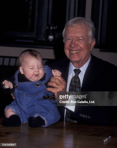 Jimmy Carter attends book party for 'The Little Baby Snoogle Fleejer' on December 13, 1995 at Barnes and Noble in New York City.