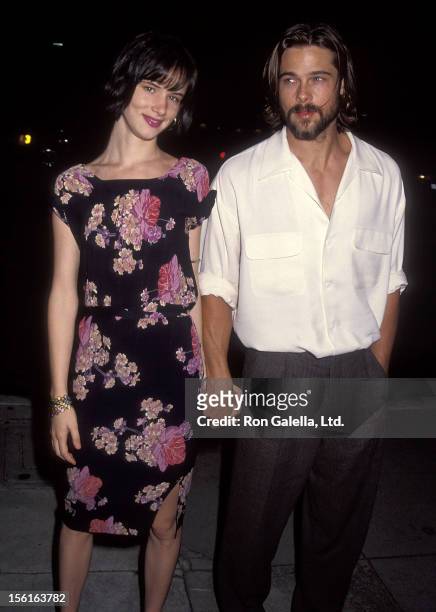Actress Juliette Lewis and actor Brad Pitt attend the 'Johnny Suede' Beverly Hills Premiere on August 19, 1992 at the Laemmle's Fine Arts Theatre in...