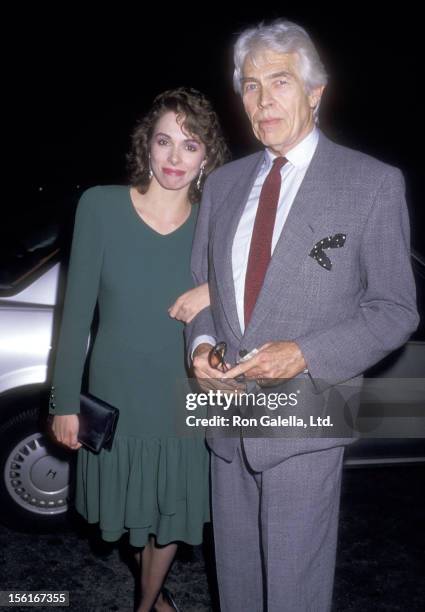 Actor James Coburn and his girlfriend Lisa Alexander on May 26, 1987 dining at Spago in West Hollywood, California.