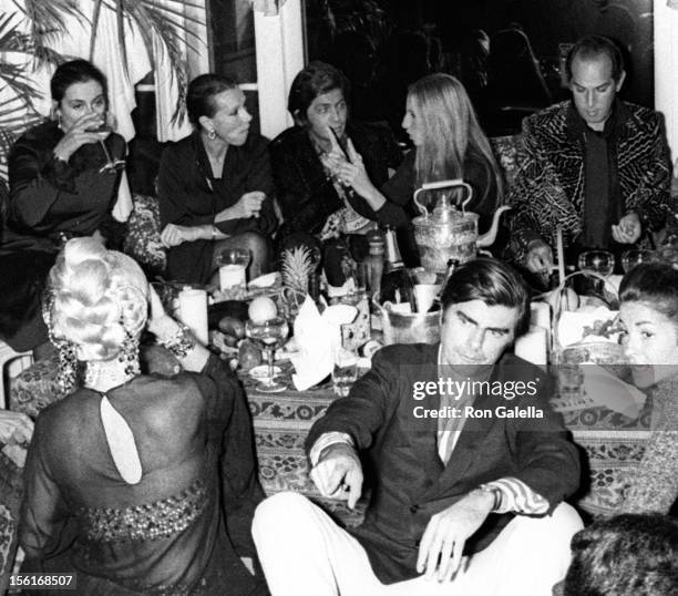 Valentino and Barbra Streisand attend Valentino Fashion Party on September 27, 1970 at the Pierre Hotel in New York City.