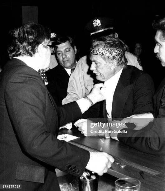 Director Sam Peckinpah in a scuffle at the 2nd Annual American Film Institute Lifetime Achievement Awards Honoring James Cagney on March 13, 1974 at...