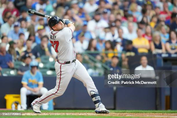Austin Riley of the Atlanta Braves hits a two-run home run against the Milwaukee Brewers in the third inning at American Family Field on July 21,...