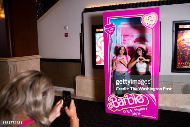 Eden Rousso Los Angeles, a writer's assistant, center, and Elana Rubin Los Angeles, a writer, pose in the outfits they dressed up in to see the movie...