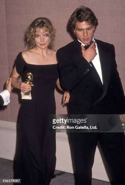 Actress Michelle Pfeiffer and actor Tom Cruise attend the 47th Annual Golden Globe Awards on January 20, 19990 at Beverly Hilton Hotel in Beverly...