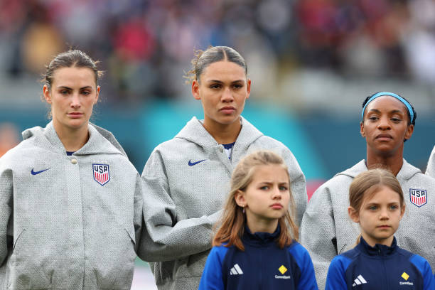 Emily Fox, Trinity Rodman and Crystal Dunn of USA line up for the national anthem prior to the FIFA Women's World Cup Australia & New Zealand 2023...