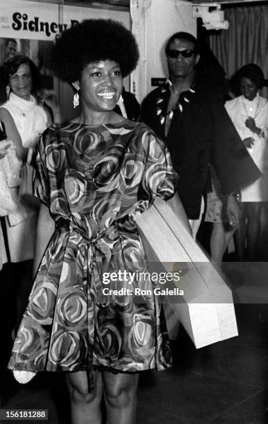 Actress/singer Abbey Lincoln and musician Max Roach attend the premiere of 'For Love Of Ivy' on July 16, 1968 at Loew's Tower East Theater in New...