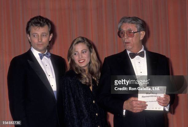 Actor Robert Mitchum, son Christopher Mitchum and granddaughter Carrie Mitchum attend the 46th Annual Golden Globe Awards on January 28, 1989 at...