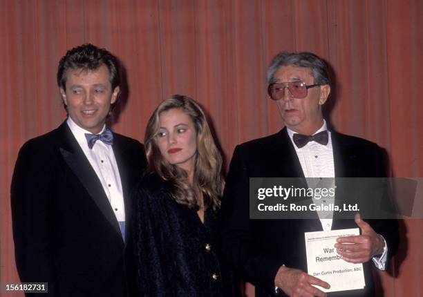 Actor Robert Mitchum, son Christopher Mitchum and granddaughter Carrie Mitchum attend the 46th Annual Golden Globe Awards on January 28, 1989 at...