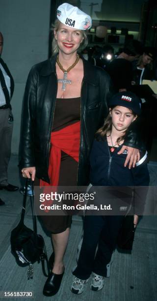 Actress Donna Dixon and daughters Danielle Aykroyd, Belle Aykroyd and Stella Aykroyd attend the grand opening of Roots Department Store in New York...