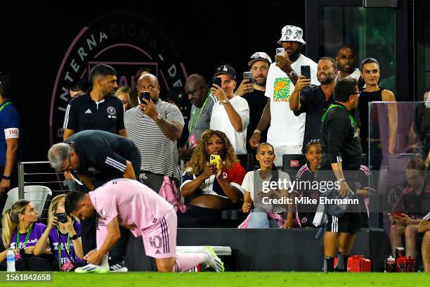 Manager Gerardo Martino of Inter Miami CF talks with Lionel Messi as WTA player Serena Williams and NBA player LeBron James of the Los Angeles Lakers...