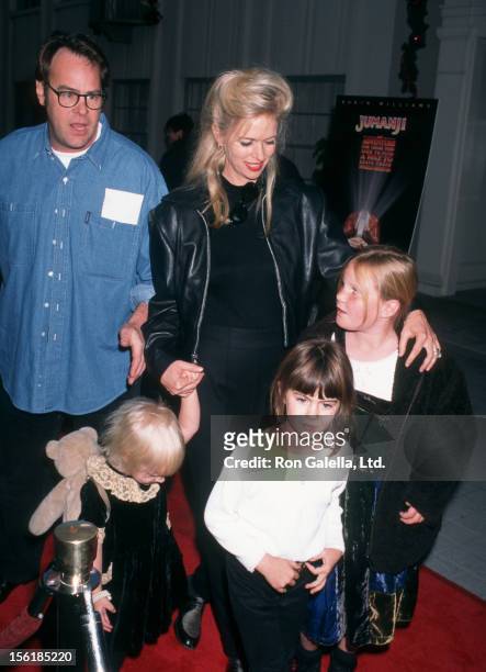 Actor Dan Aykroyd, actress Donna Dixon and daughters Danielle Aykroyd and Belle Aykroyd attend the world premiere of 'Jumanji' on December 10, 1995...
