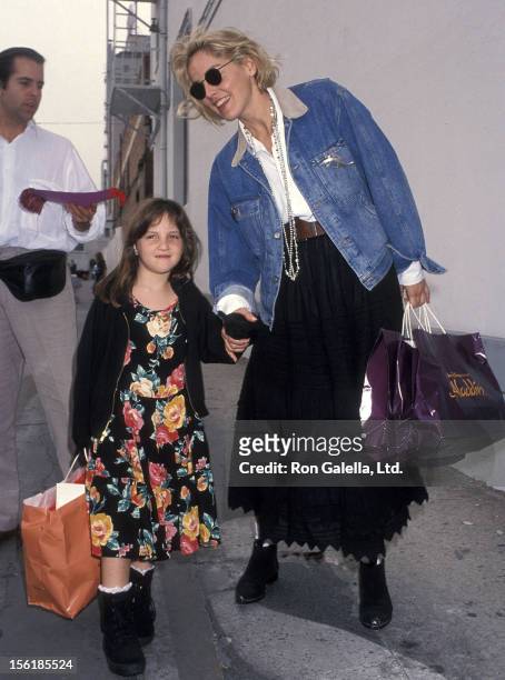 Actress Sharon Stone and Goddaughter attend the 'Aladdin' Hollywood Premiere on November 8, 1992 at the El Capitan Theatre in Hollywood, California.