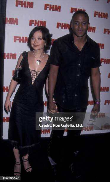 Actor Wayne Brady and wife Mandie Taketa attend FHM Magazine Salutes '100 Sexiest Women in the World' on May 17, 2001 at La Boehme Restaurant in...