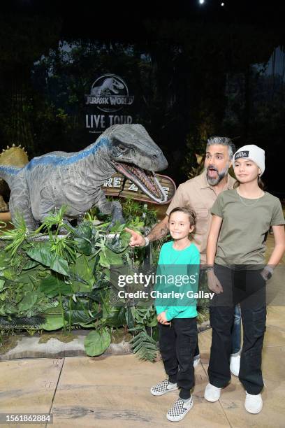 Jaime Camil III, Jaime Camil, and Elena Camil attend the Jurassic World Live Tour VIP Event at Crypto.com Arena on July 21, 2023 in Los Angeles,...