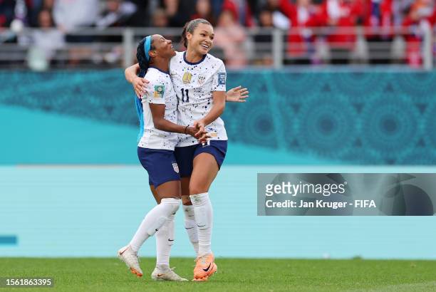 Sophia Smith of USA celebrates with teammate Crystal Dunn after scoring her team's second goal during the FIFA Women's World Cup Australia & New...