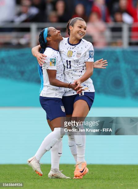 Sophia Smith of USA celebrates with teammate Crystal Dunn after scoring her team's second goal during the FIFA Women's World Cup Australia & New...