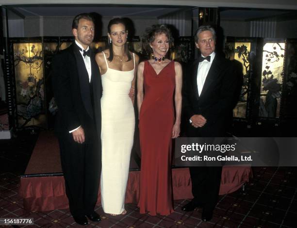 Businessman Edgar Bronfman, Jr. And wife Clarissa Alcock, actress Mary Tyler Moore and actor Michael Douglas attend the Juvenile Diabetes Research...