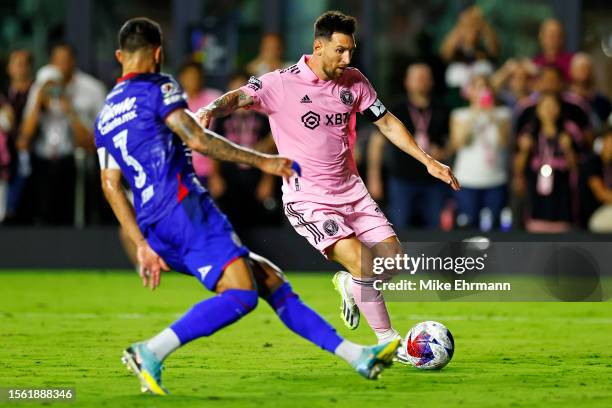 Lionel Messi of Inter Miami CF controls the ball against Jaiber Jiménez of Cruz Azul during the second half of the Leagues Cup 2023 match between...