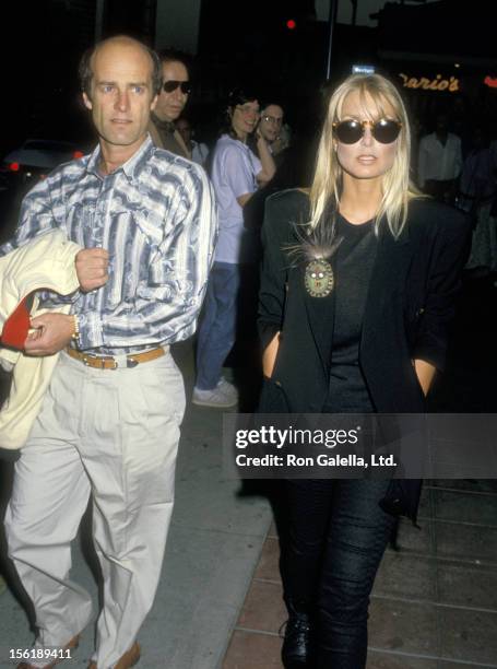 Actress Heather Thomas and date Harry M. Brittenham on May 12, 1988 dining at the Pips Club in los Angeles, California.