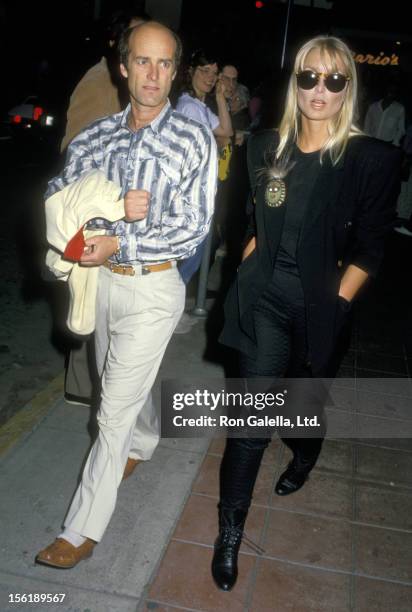 Actress Heather Thomas and date Harry M. Brittenham on May 12, 1988 dining at the Pips Club in los Angeles, California.