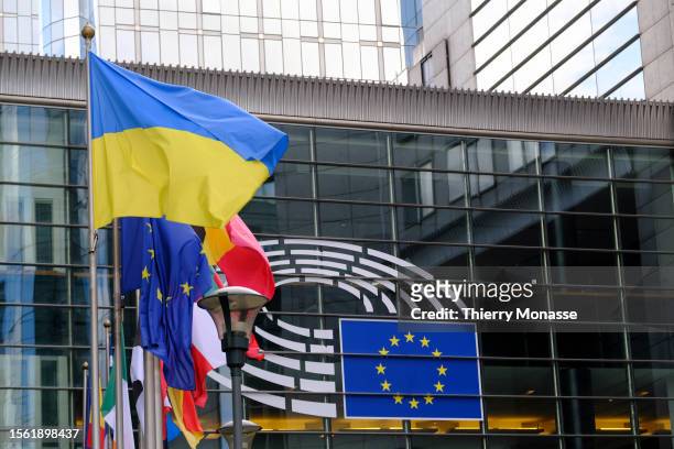 The Ukrainian, the EU and the EU countries flags are seen in front of the European Parliament on July 28, 2023 in Brussels, Belgium. The EU is united...