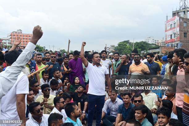 Bangladesh Nationalist party activists block a highway entering Bangladesh's capital during a protest demanding the resignation of Prime Minister...