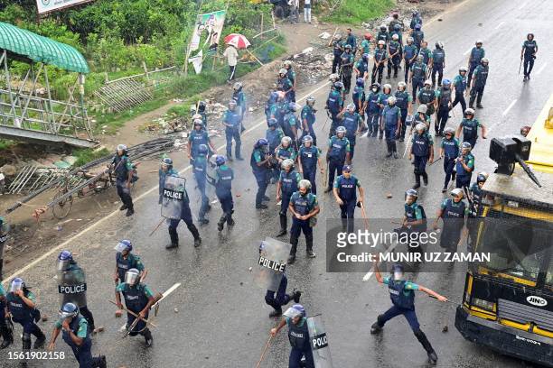 Police clash with Bangladesh Nationalist party activists blocking a highway entering Bangladesh's capital during a protest demanding the resignation...