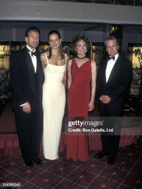 Businessman Edgar Bronfman, Jr. And wife Clarissa Alcock, actress Mary Tyler Moore and actor Michael Douglas attend the Juvenile Diabetes Research...