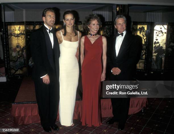 Businessman Edgar Bronfman, Jr. And wife Clarissa Alcock, actress Mary Tyler Moore and actor Michael Douglas attend the Juvenile Diabetes Research...