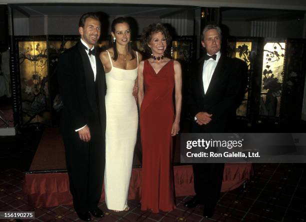 Businessman Edgar Bronfman, Jr. And wife Clarissa Alcock, actress Mary Tyler Moore and actor Michael Douglas attend the Juvenile Diabetes Research...