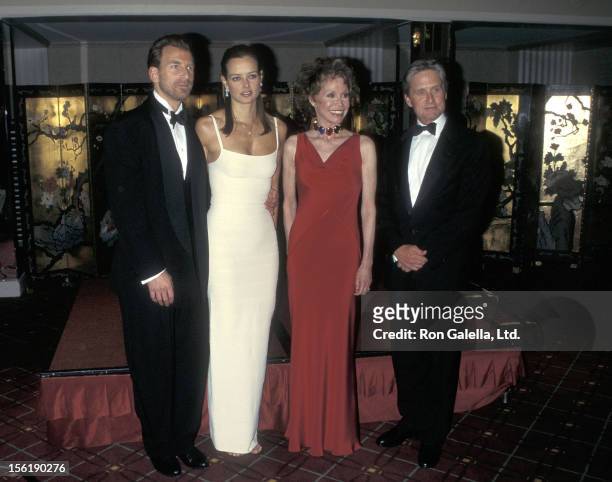 Businessman Edgar Bronfman, Jr. And wife Clarissa Alcock, actress Mary Tyler Moore and actor Michael Douglas attend the Juvenile Diabetes Research...