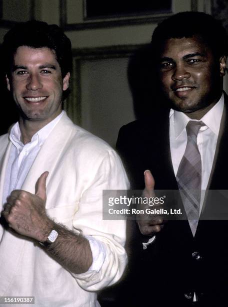 Actor John Travolta and athlete Muhammad Ali attend the Children's Peace Foundation Press Conference to Annouce the Launch of the Children's Peace...
