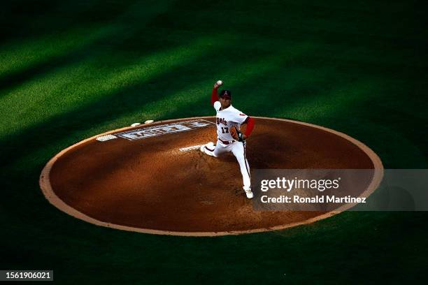 Shohei Ohtani of the Los Angeles Angels throws against the Pittsburgh Pirates in the second inning at Angel Stadium of Anaheim on July 21, 2023 in...