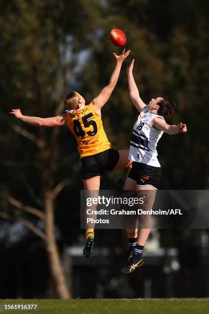 Elli Symonds of the Dandenong Stingrays and Lauren Jatczak of the Northern Knights compete for the ball during the round 15 Coates Talent League...