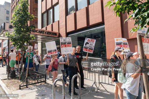 Striking members of Writers Guild of America picketing in front of CBS Broadcast Center on theme Sport Writers Picket. Executives from NHL Players...