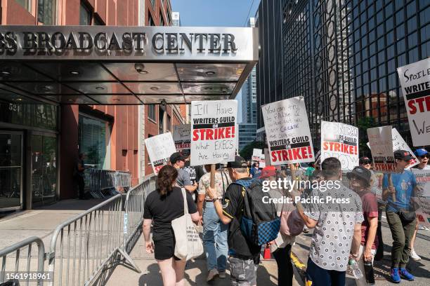 Striking members of Writers Guild of America picketing in front of CBS Broadcast Center on theme Sport Writers Picket. Executives from NHL Players...