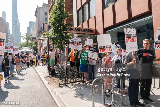 Striking members of Writers Guild of America picketing in front of CBS Broadcast Center on theme Sport Writers Picket. Executives from NHL Players...