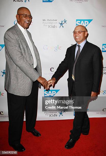 Former NBA player George "The Iceman" Gervin and MLB Hall of Fame legend Reggie Jackson attend the 8th All Star Celebrity Classic benefiting the Mr...