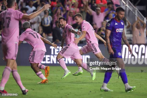 Lionel Messi of Inter Miami CF celebrates with teammates after kicking the game winning goal during the second half of the Leagues Cup 2023 match...