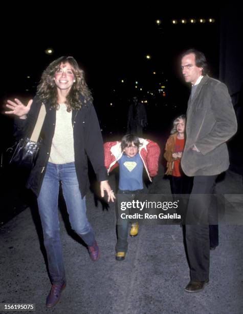 Musicians Carly Simon, James Taylor, son Ben Taylor and daughter Sally Taylor on November 14, 1980 walking outside 135 Central Park West, Carly...