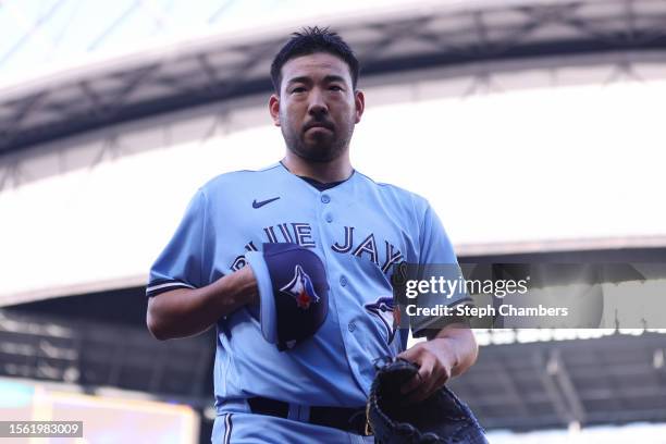 Yusei Kikuchi of the Toronto Blue Jays looks on before the game against the Seattle Mariners at T-Mobile Park on July 21, 2023 in Seattle, Washington.