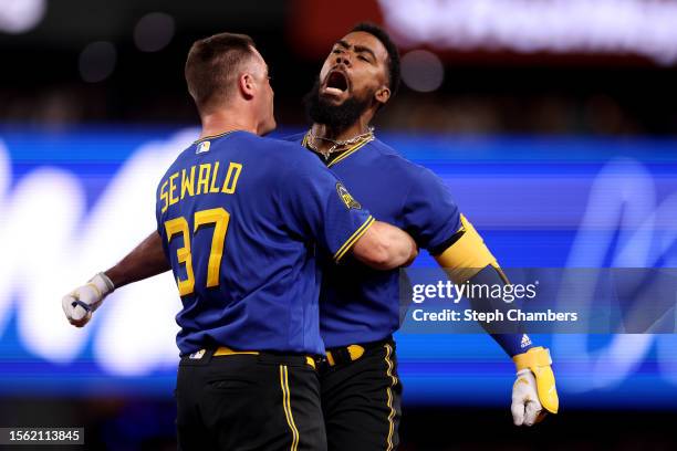 Paul Sewald celebrates a walk-off single by Teoscar Hernandez of the Seattle Mariners during the ninth inning against the Toronto Blue Jays at...