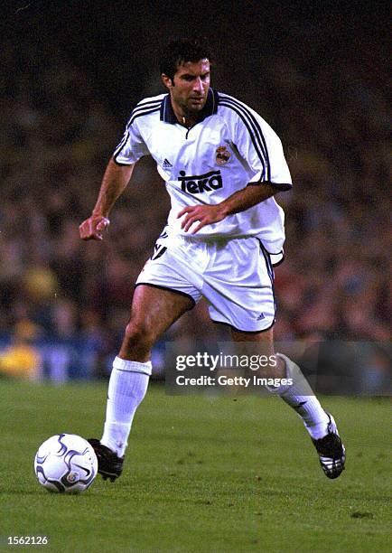 Luis Figo of Real Madrid in action during the Spanish Primera Liga match between Barcelona and Real Madrid at the Nou Camp in Barcelona, Spain....